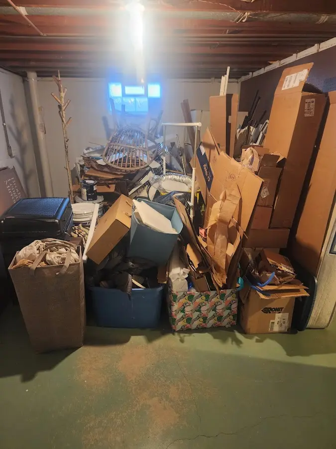 Roll-off dumpster container at job site for 15 Yard Dumpster Rental in Rome